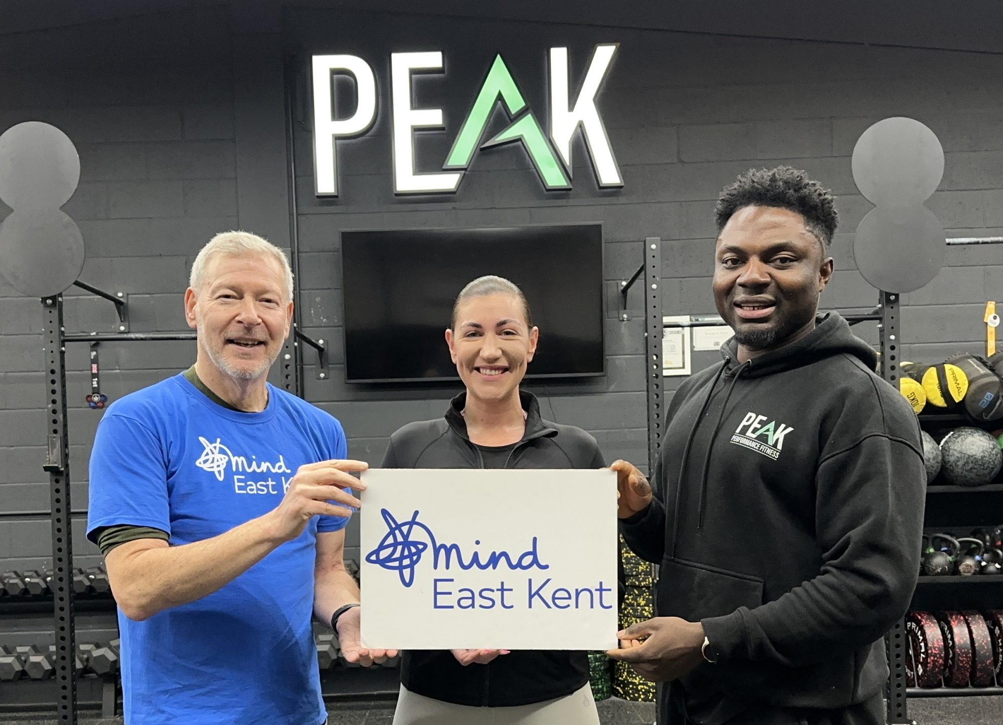 Simon with fitness trainers Molly Gosling and Newman Poku