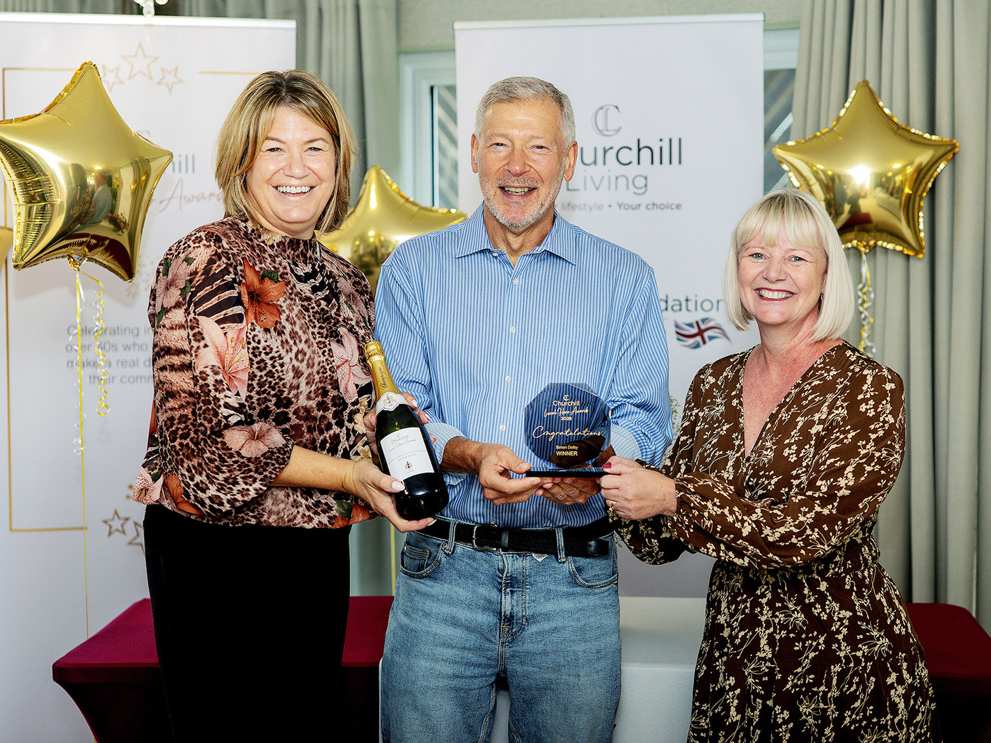 Simon Dolby receiving his Kent Local Hero award